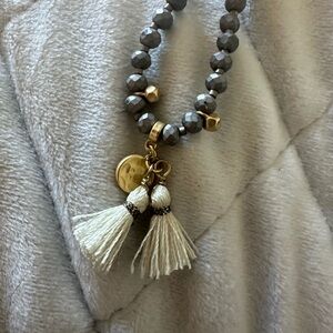 Elegant Gold and Cream Beaded Bracelet with Tassels